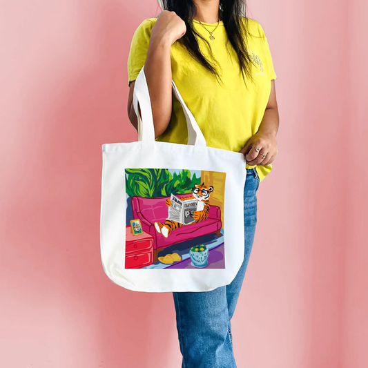 "Tiger's Leisure: Pop Art Illustration of a Relaxing Read" Artistic Tote Bag