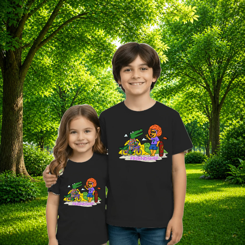 Sibling styling view of PaintzStories artistic kids t-shirt featuring Crocodile and Lion's Friendship artwork with colourful illustration, premium cotton comfort, art tee shirt, and kids artistic t-shirt.