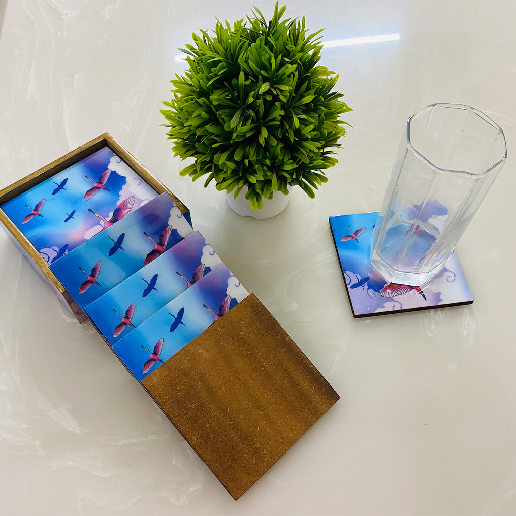 '"Stunning birds in a colourful sky" Artistic Wooden Cutlery-Wooden Tea Coaster I Table ware I Handmade I Home Décor I Meena Print I Size- 4*4 Inch