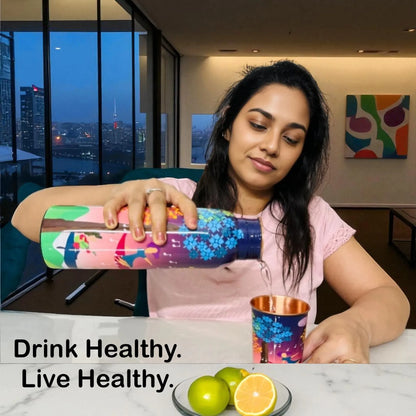Woman drinking from Tree Serenade copper bottle showing lifestyle daily use
