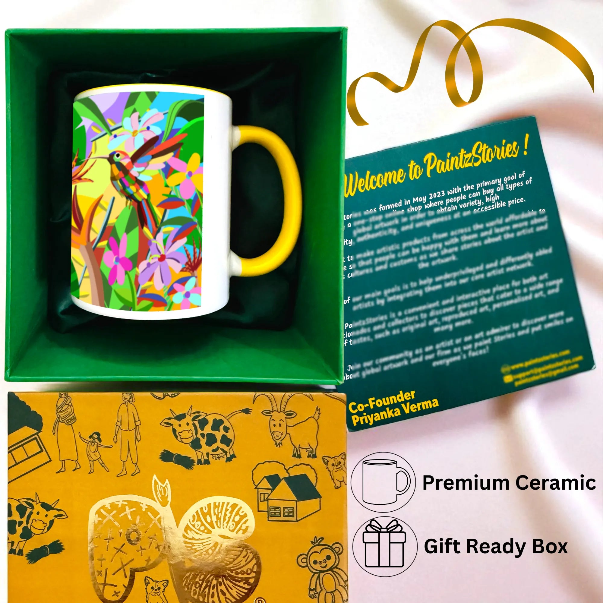 Vibrant Bird mug inside gift box with all included items