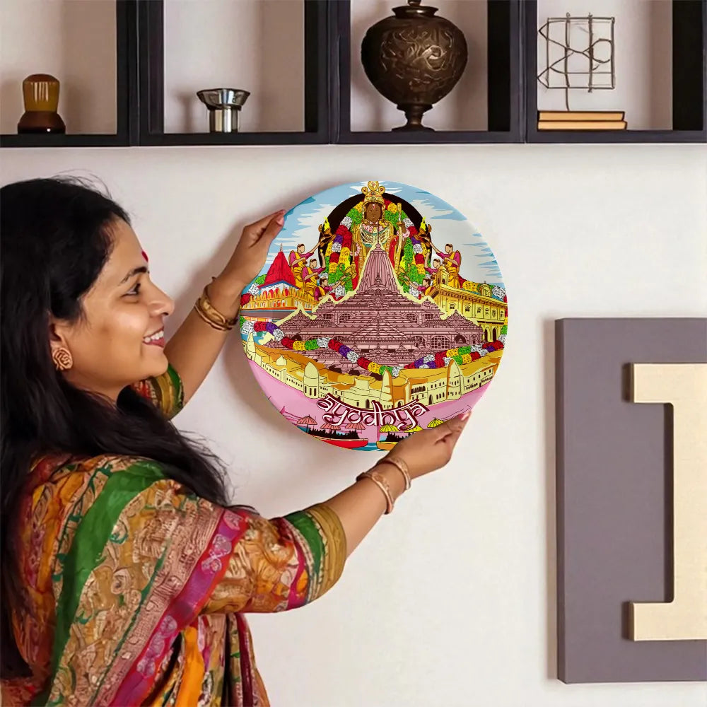 Woman holding Ayodhya decorative plate
