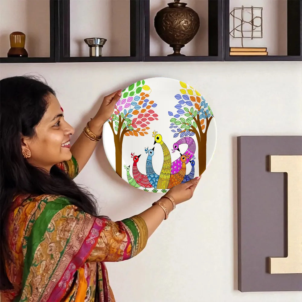 Woman displaying Dancing Peacocks plate
