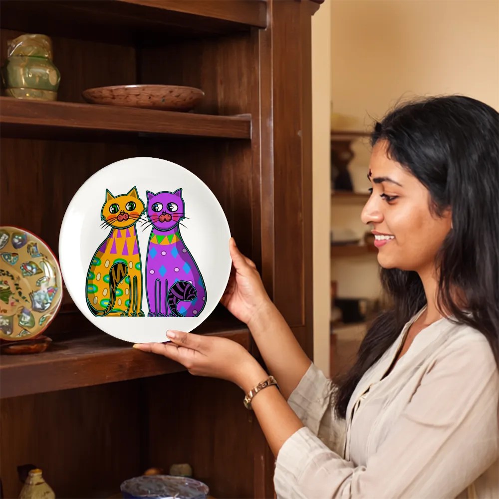 Woman holding Two Fancy Cats decorative plate