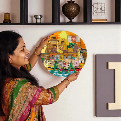 Woman displaying Varanasi decorative plate