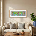 Saving Trees artwork above sofa