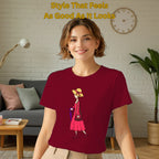 Female model wearing A Walking Lady artistic t-shirt in Maroon