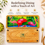 PaintzStories elegant flamingo artwork in a lush green setting on an artistic rectangular wooden platter for elegant dining and table decor